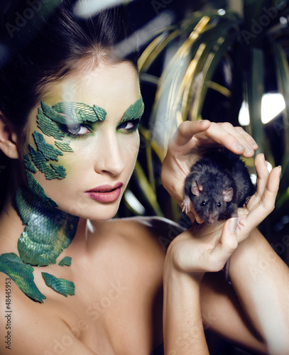 Photo: woman snake with rat woman snake with rat