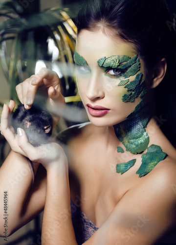 Photo: woman snake with rat woman snake with rat