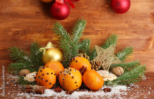 Photo: christmas composition with oranges and fir tree, christmas composition with oranges and fir tree,