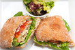 ciabatta panini sandwich with chicken and tomato