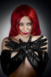 Red hair sexy woman with latex gloves