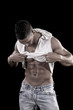 muscled man on a black background