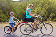 Foto: Family on a tandem bicycle ride Family on a tandem bicycle ride