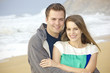 Photo: Beautiful Couple Portrait on the Beach Beautiful Couple Portrait on the Beach