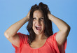 Foto: Crazed and Frustrated Woman pulling her hair Crazed and Frustrated Woman pulling her hair