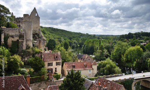 Photo: Medieval French Riverside Village with ruined Castle Medieval French Riverside Village with ruined Castle