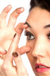 Young woman with contact lense