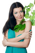 Photo: Beautiful woman with spring green leaves Beautiful woman with spring green leaves