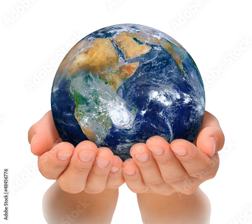 Photo: Hands of woman holding globe, Africa and Near East Hands of woman holding globe, Africa and Near East