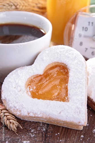 Photo: heart shape biscuit and coffee heart shape biscuit and coffee