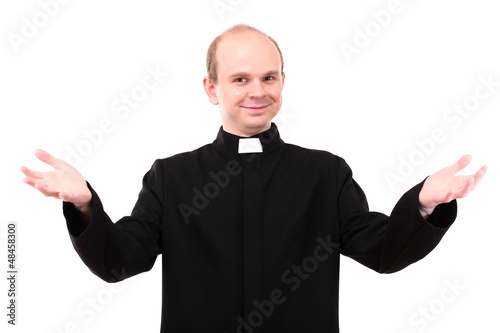Photo: Young priest isolated on white Young priest isolated on white