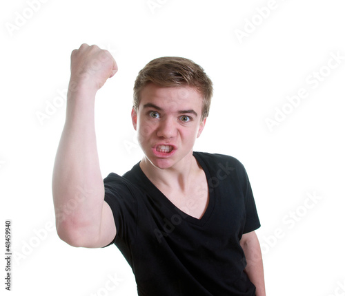 Photo: Selbstbewusster Teenager zeigt Faust Selbstbewusster Teenager zeigt Faust
