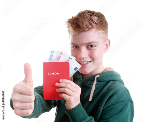 Photo: Junge zeigt Sparbuch und Geldscheine Junge zeigt Sparbuch und Geldscheine