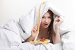young woman eating spoon