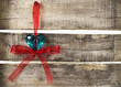 Turquoise heart on old wooden background