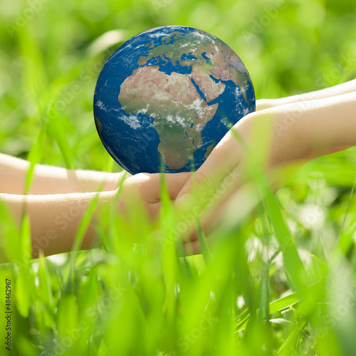 Photo: Earth in children`s hands Earth in children`s hands
