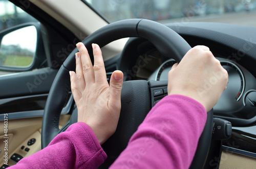 Photo: Beeping car driver Beeping car driver