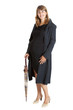 A pregnant woman (9 months) with a umbrella