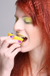 redhaired girl eating the lemon