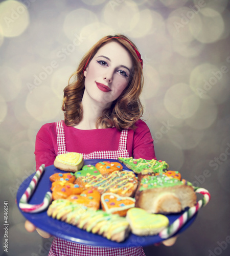 Photo: Redhead women with cookies Redhead women with cookies