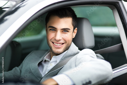 Photo: Handsome man in his car Handsome man in his car