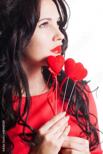 Photo: Girl with heart in hand Girl with heart in hand