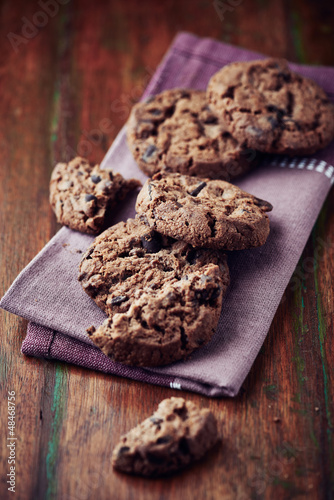 Photo: Dark chocolate chip cookies on a napkin Dark chocolate chip cookies on a napkin