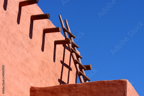 Photo: Wood Ladder on Adobe Wall Wood Ladder on Adobe Wall