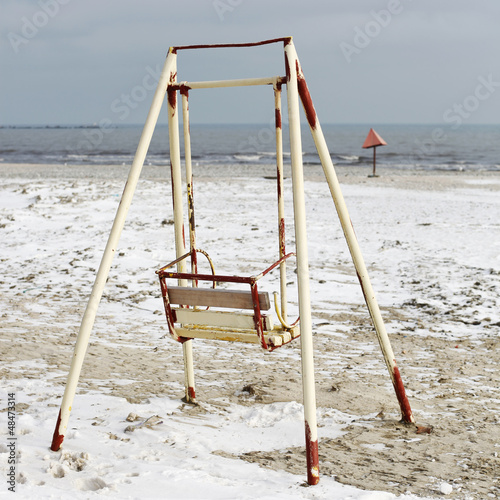 Photo: Old swing on the beach Old swing on the beach