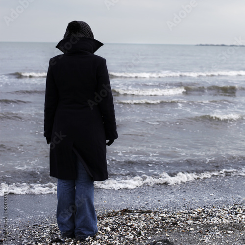 Photo: Lonely person on a beach Lonely person on a beach