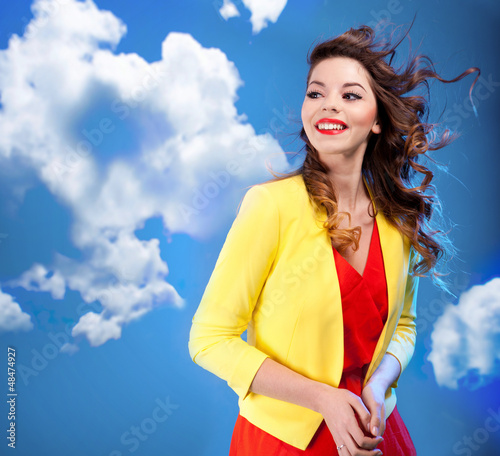 Photo: Colorful portrait of a beautiful happy young woman Colorful portrait of a beautiful happy young woman