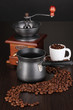 Coffee maker and coffee mill on brown table