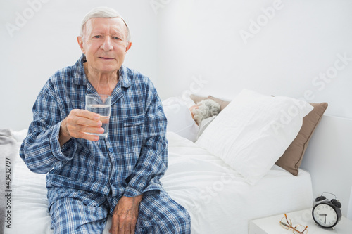 Photo: Old man with a water glass Old man with a water glass