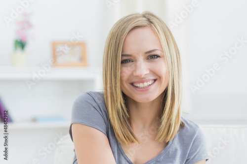 Photo: Close-up of beautiful woman smiling at home Close-up of beautiful woman smiling at home