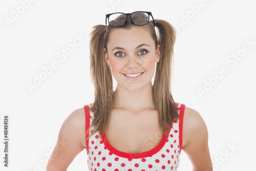 Photo: Young woman with long ponytails Young woman with long ponytails