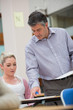 Lecturer talking to student