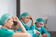 Group of sad surgeons sitting on the floor