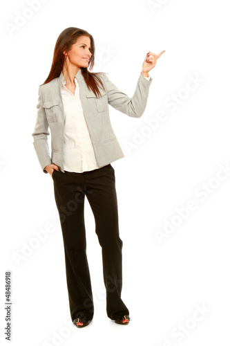 Photo: A full length portrait business woman shows A full length portrait business woman shows