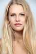 Sexy  blond girl with beautiful  long straight hair