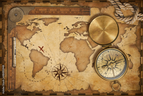 Photo: aged treasure map, ruler, rope and old brass compass with lid aged treasure map, ruler, rope and old brass compass with lid