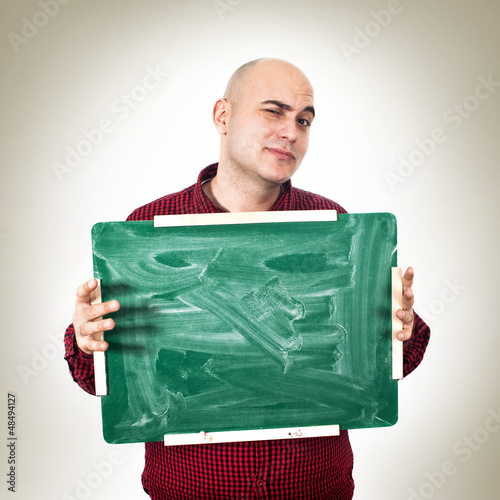 Photo: Man with chalkboard Man with chalkboard