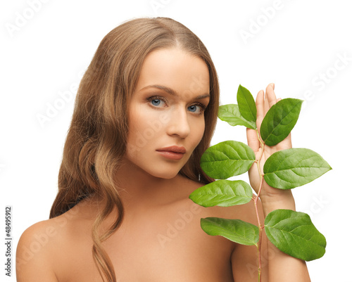 Photo: woman with green leaf woman with green leaf