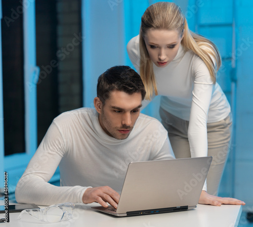 Photo: man and woman in laboratory man and woman in laboratory