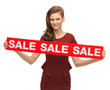 teenage girl in red dress with sale sign
