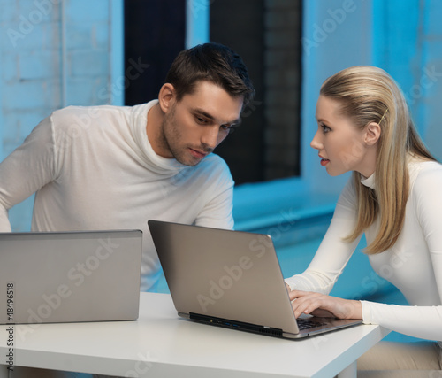 Photo: man and woman in laboratory man and woman in laboratory