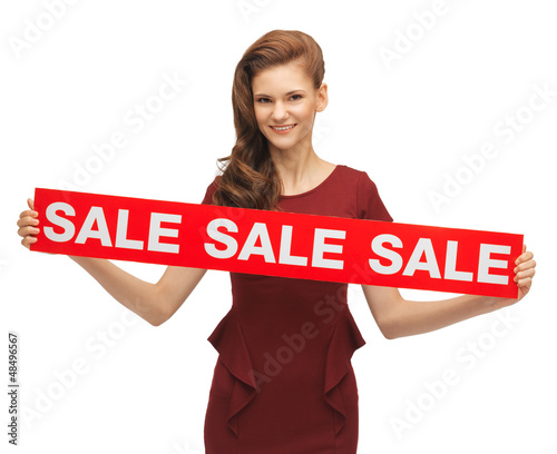 Photo: teenage girl in red dress with sale sign teenage girl in red dress with sale sign