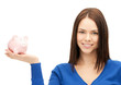 lovely woman with piggy bank