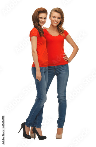 Photo: two beautiful teenage girls in red t-shirts two beautiful teenage girls in red t-shirts