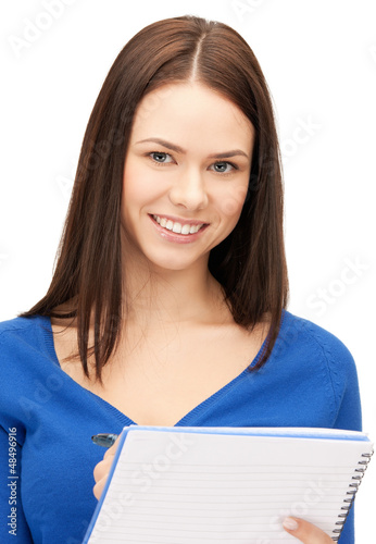 Photo: woman with notepad woman with notepad