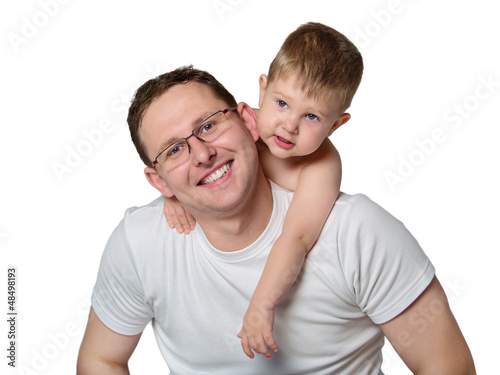 Photo: Closeup portrait of a happy father and son together Closeup portrait of a happy father and son together